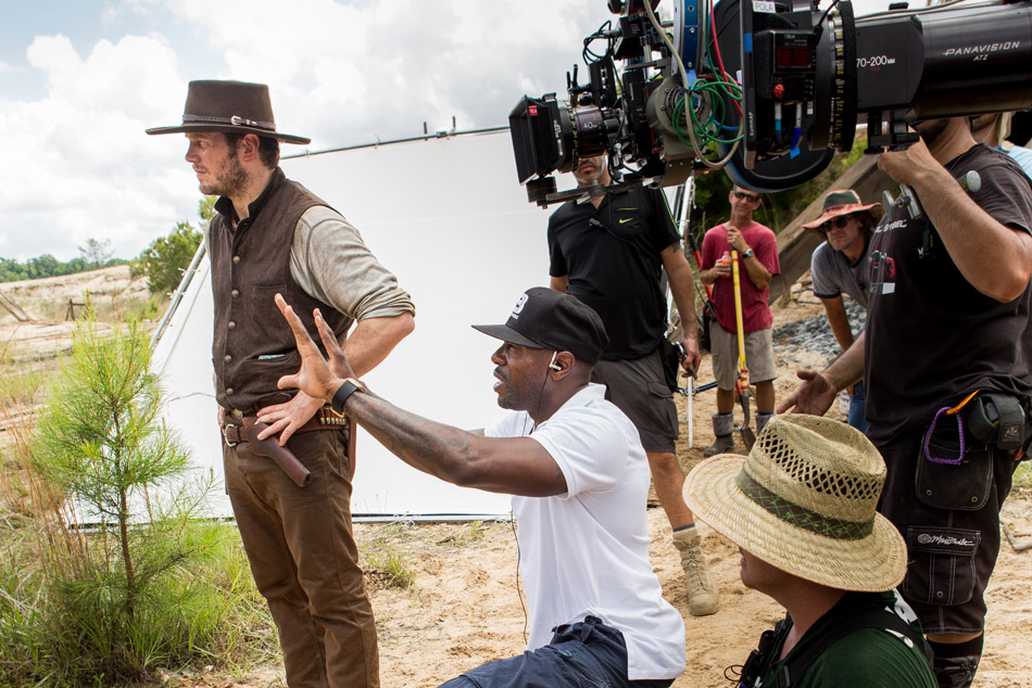 Director Antoine Fuqua giving instructions to Chris Pratt on the set of The Magnificent Seven